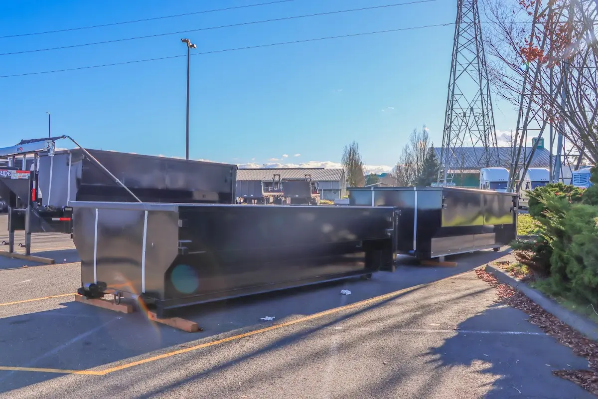 Roll-off dumpster ready for waste disposal at job site for Concrete Dumpster Rental in Bothell